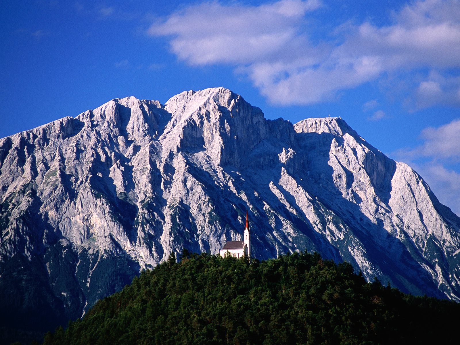 hillside-church-and-mount-griesspitzen--tirol--austria